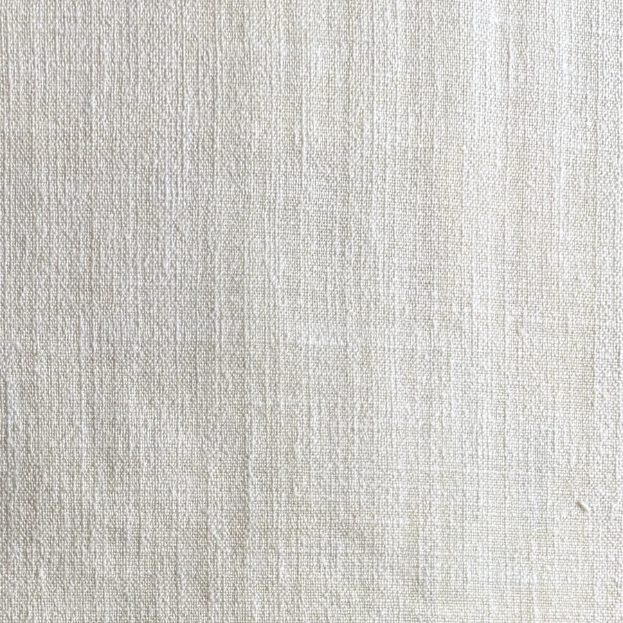 Cream cloth in a close plain weave.